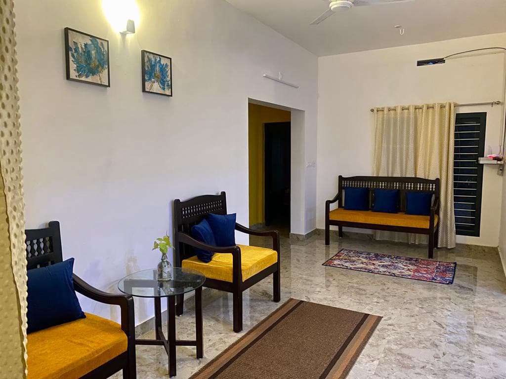 Cozy interior seating lounge at Hill Side Service Villa
