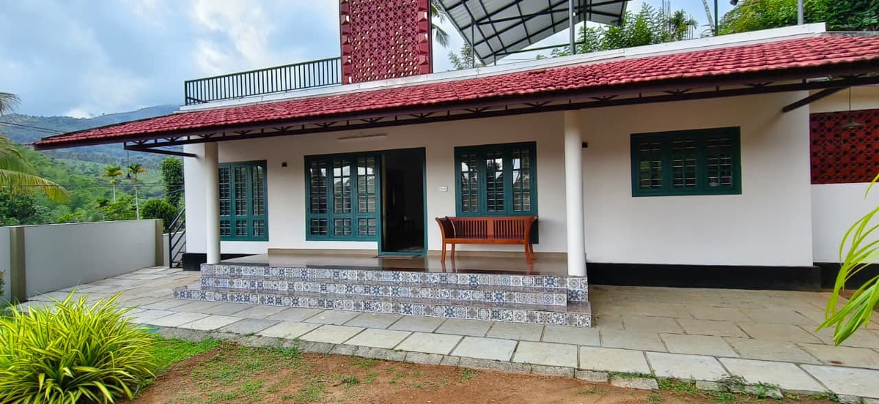 Modern daytime exterior of Hill Side Service Villa in Wayanad