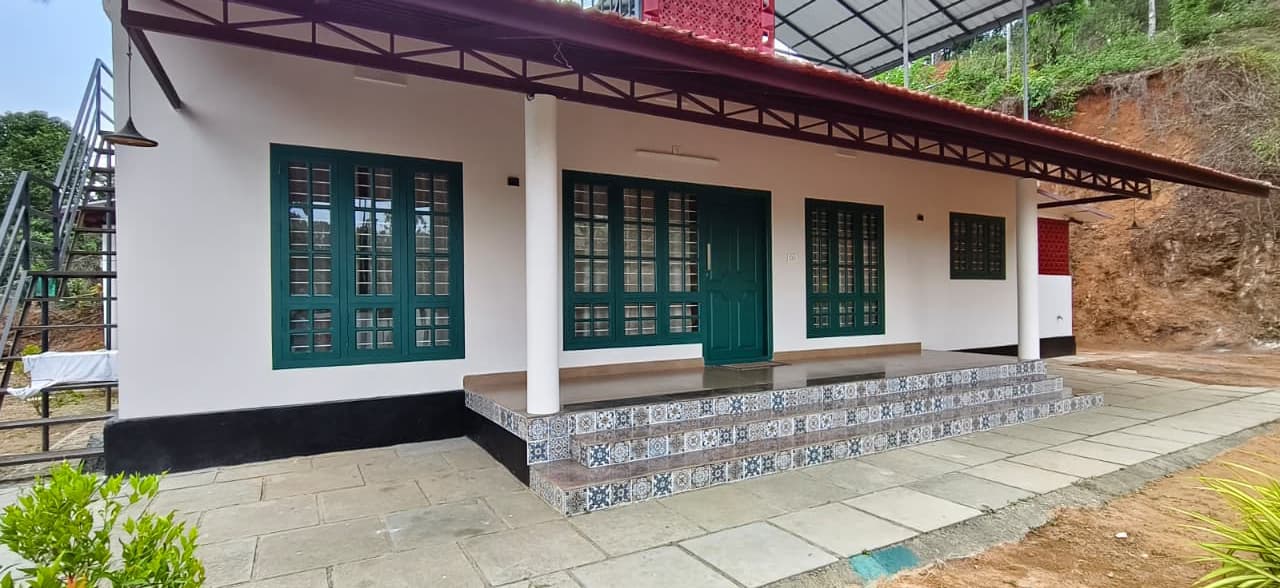 Side view of the modern multi-story villa structure